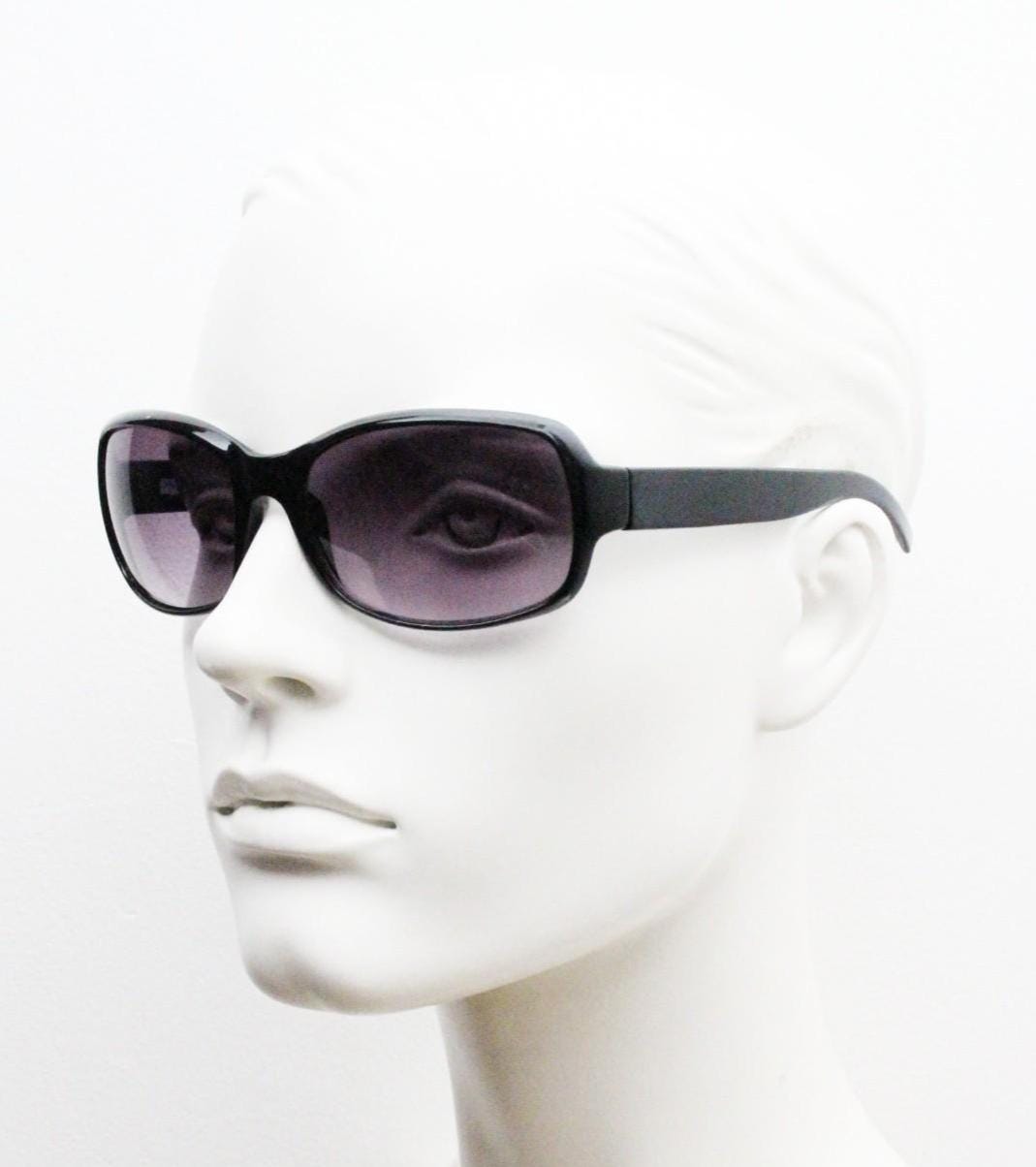Y2k vintage wrap around rectangular sunglasses. Curved black gloss frame with graduating grey lenses. 2000's bug eye. NOS