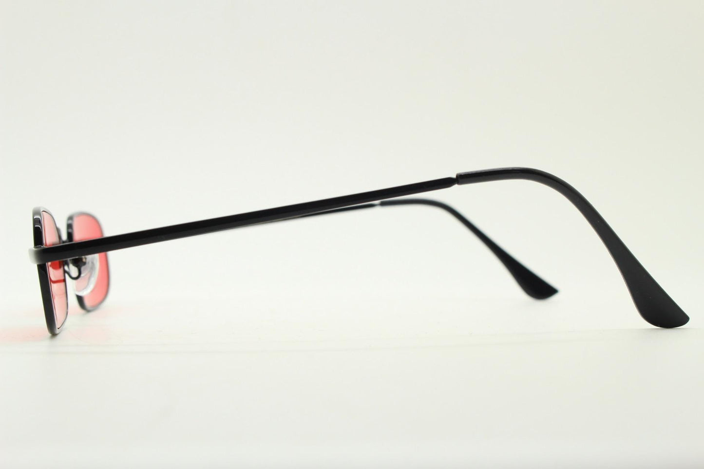 90s vintage small rectangular sunglasses. Imposing minimal black metal victorian style frame with deep red lenses. Unused BNWT