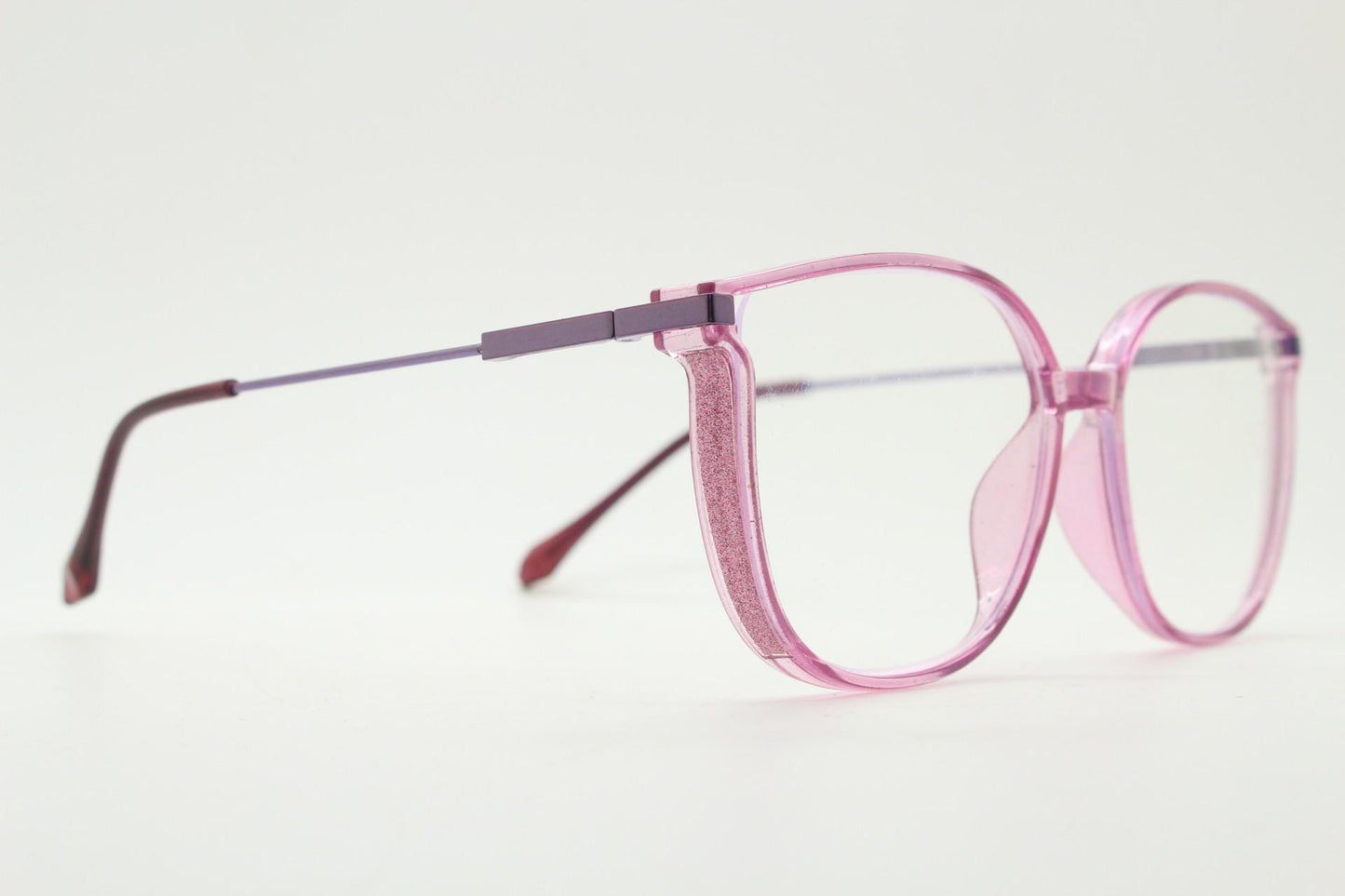 Round cat eye glasses. Transparent pink cateye optical frame with purple metal arms and eyecatching glitter sides. Vintage Prescription RX