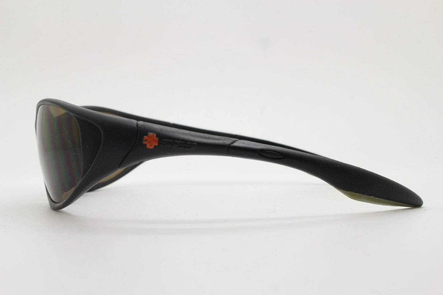 Y2K vintage sport shield aerodynamic sunglasses. All black rubber finish wraparound bug eye visor with brown lenses. 2000's. 90s