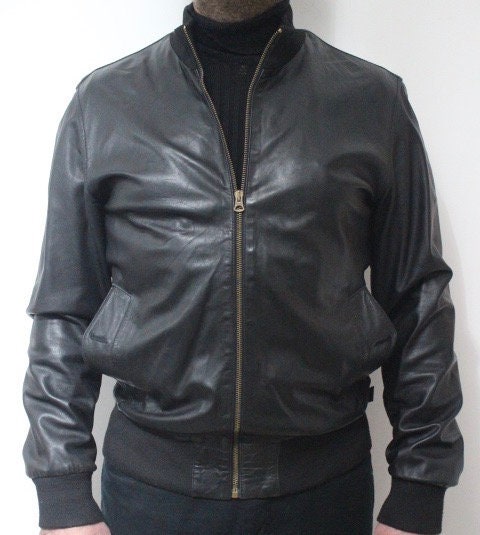 Paul Smith high collar bomber jacket. Plain black lambskin minimal flap pocket mens zipper. Ribbed collar. Size Medium