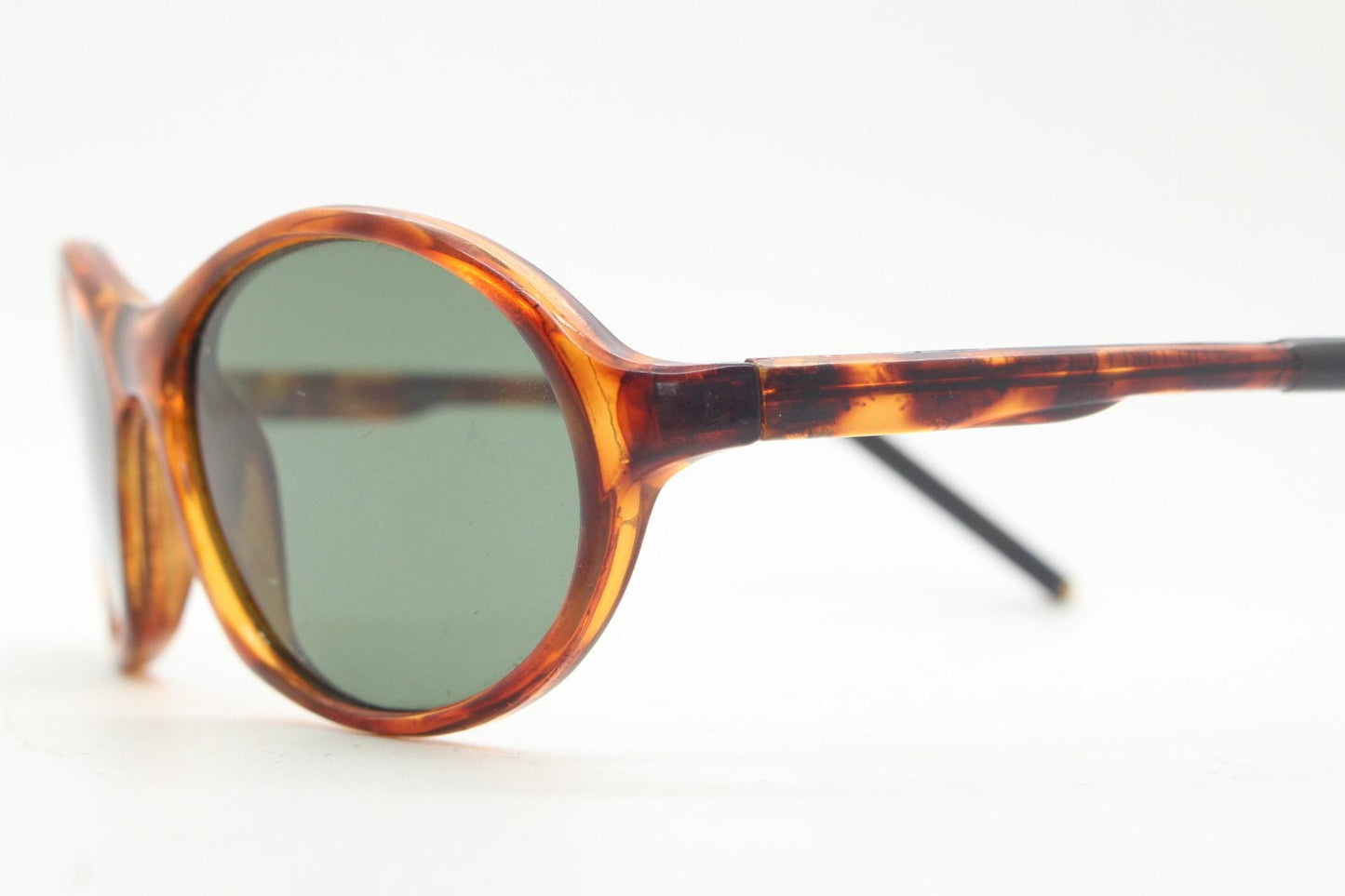 90s vintage oval small bug eye sunglasses. Tortoise gloss frame with quality real green glass lenses
