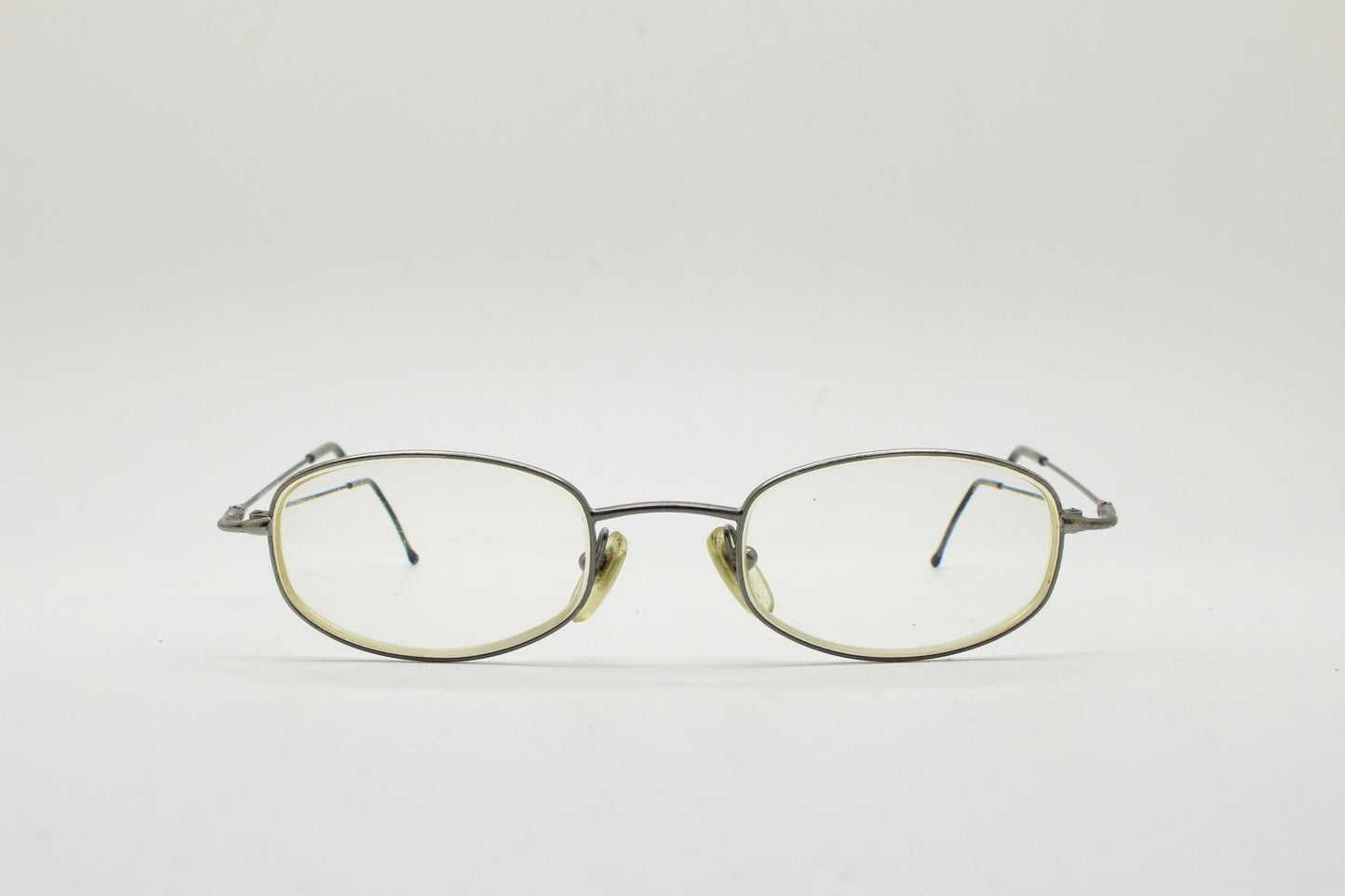 Giorgio Armani 90s vintage angular oval eye glasses made in Italy. Minimal grey chrome metal optical frame. Prescription RX spectacles