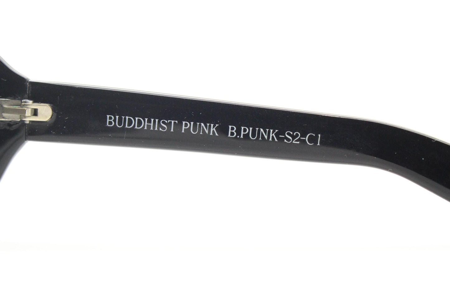 Buddhist Punk wrap around sunglasses hand made by Linda Farrow. Black acetate frame with abstract cut out patterns. Projects. Vintage. NOS