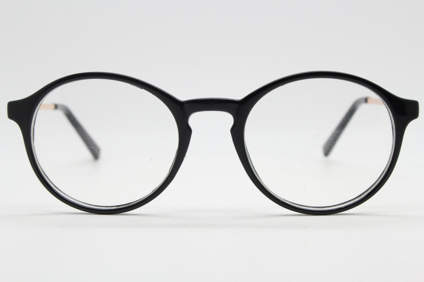 90s vintage round glasses. 30s, 20s style black optical frames with gold arms. Prescription eyeglasses with clear lenses. RX spectacles. NOS