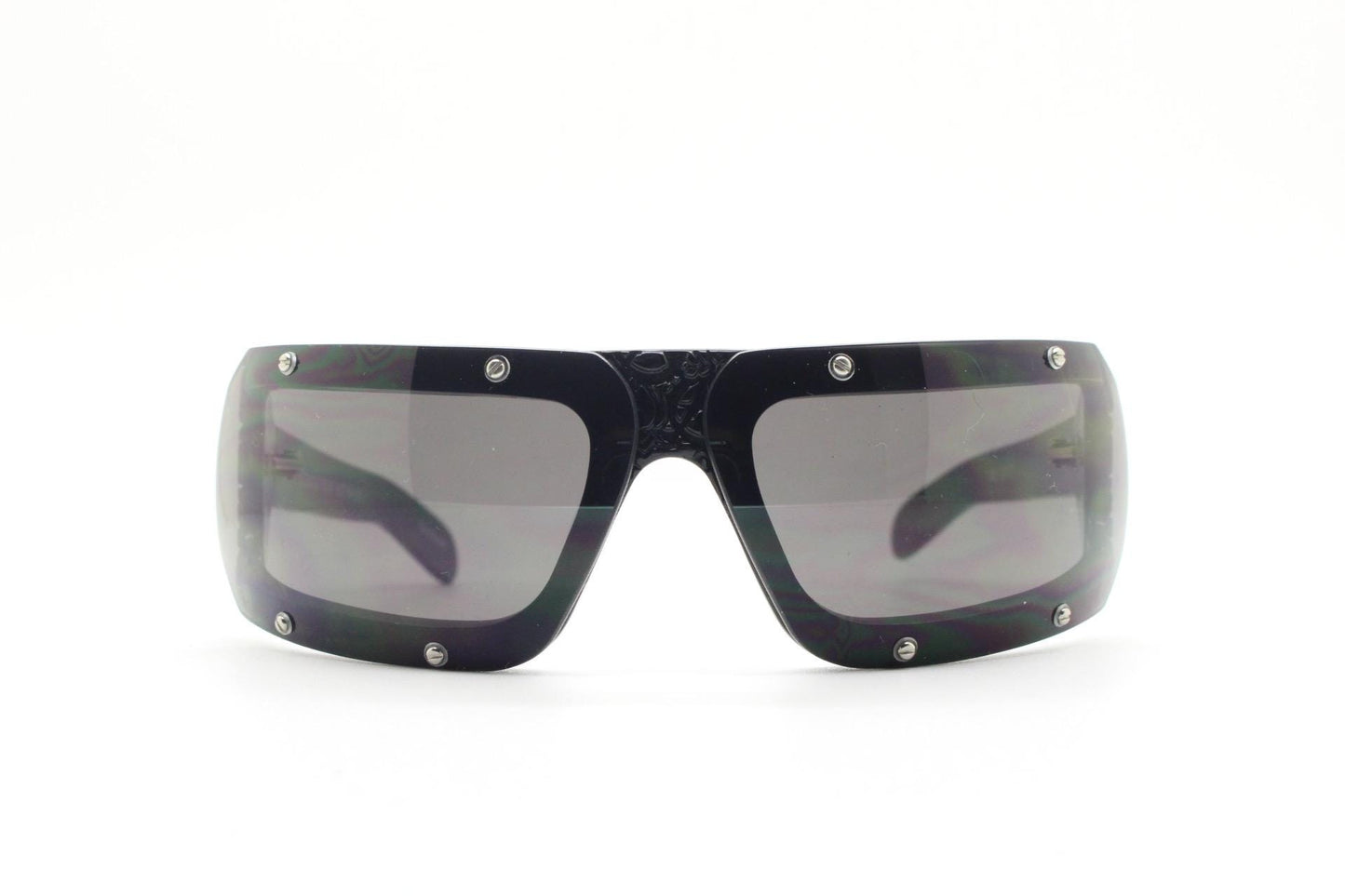 Buddhist Punk wrap around sunglasses hand made by Linda Farrow. Black acetate frame with abstract cut out patterns. Projects. Vintage. NOS