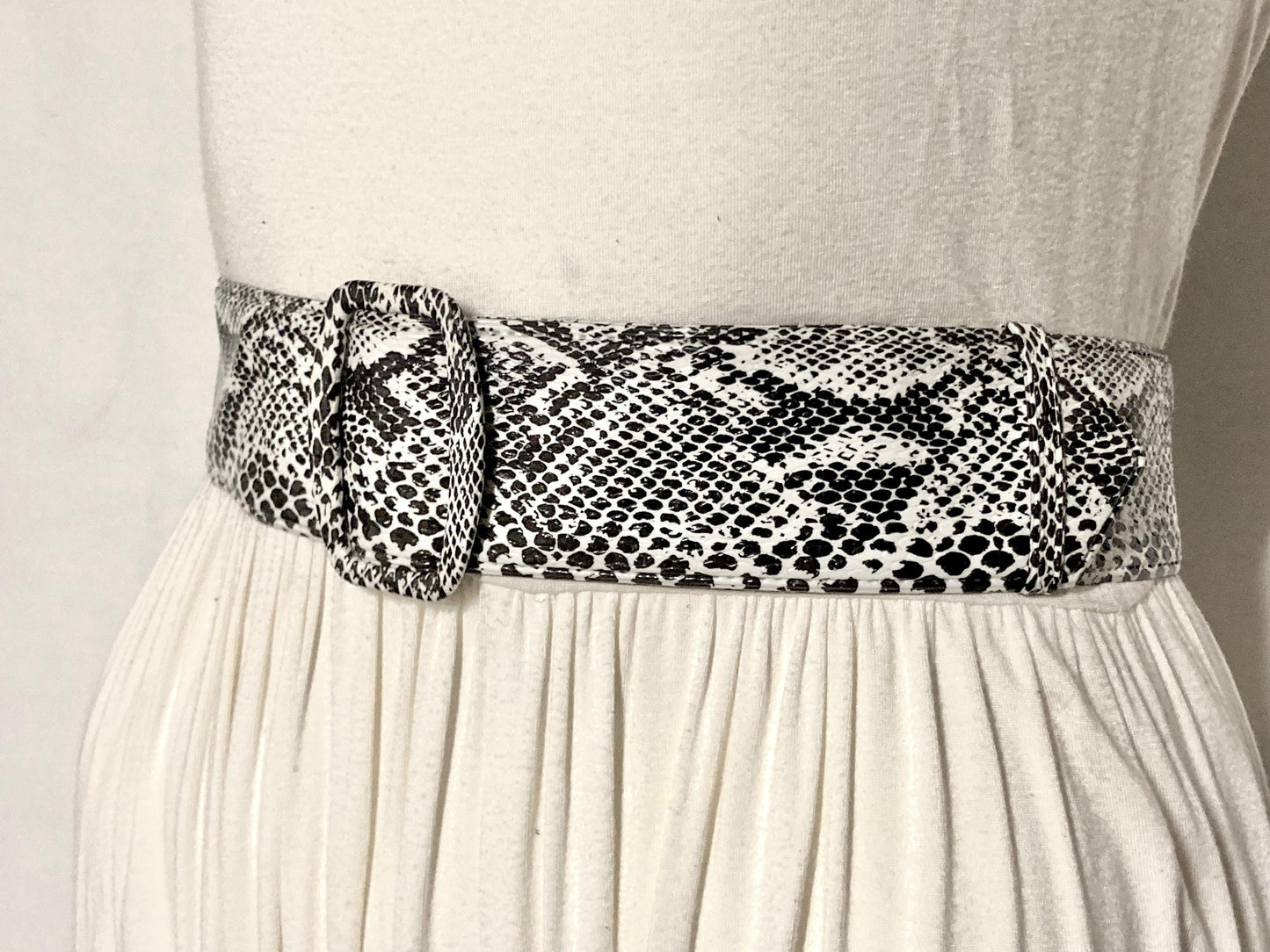 80s vintage womens clean black and white rattle snake 2" belt. Neat flat vinyl design that stays in position. For dress feature. Unused NOS