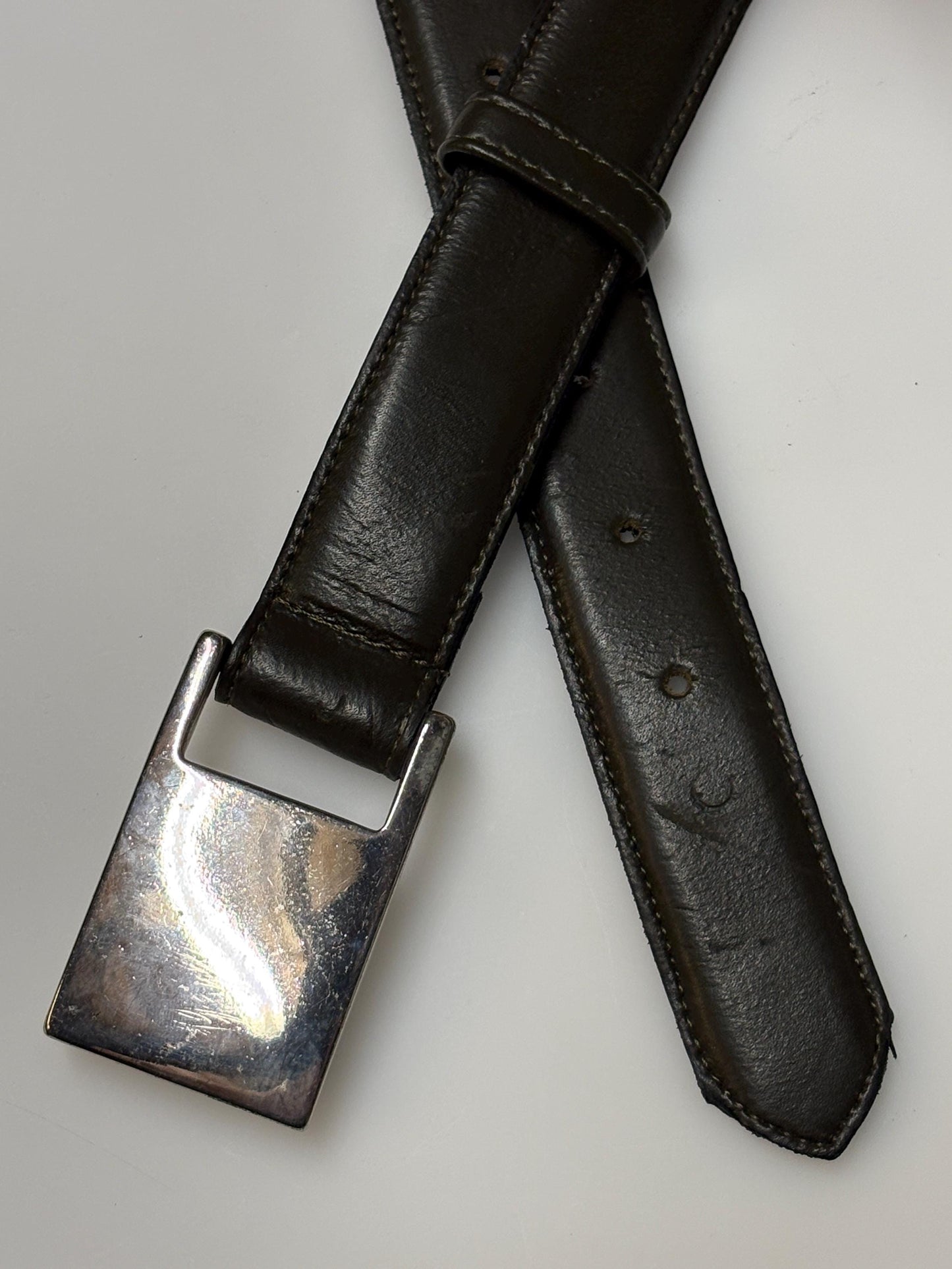 90s vintage smart trouser / jeans belt in dark green genuine leather with solid shiny chrome buckle. Made in France. NOS
