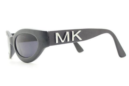 Michael KORS 90s vintage cateye sunglasses. Gunmetal grey chunky matt finish acetate cat eye with big logo. Prototype sample. NOS