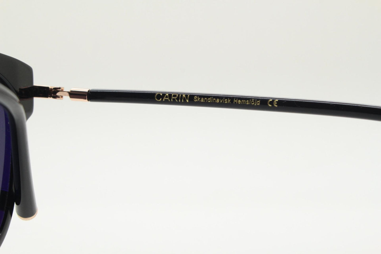 Carin round cat eye sunglasses, Gold metal frame with black cateye insets and matched dark tone lenses and slender arms