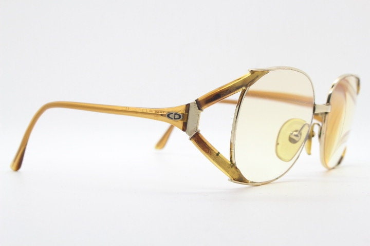 Christian Dior 70s vintage round eyeglasses model 2524 made in Germany from Optyl. Transparent brown optical frame. Prescription eyeglasses