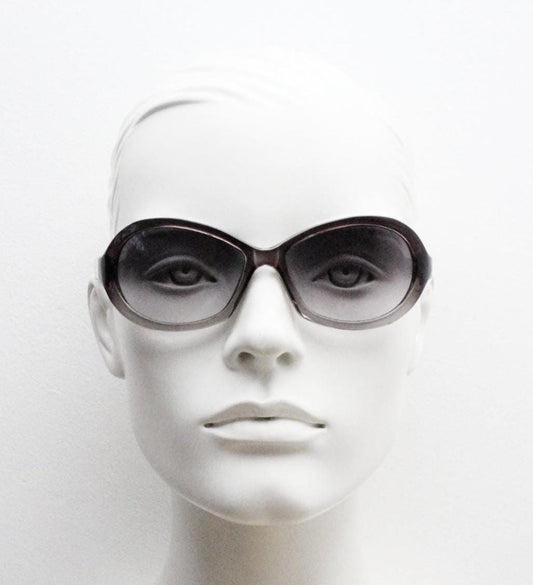 Y2K vintage oval bug eye sunglasses. Tasteful transparent grey acetate frame with matching graduated lenses. 2000s NOS. BNWT