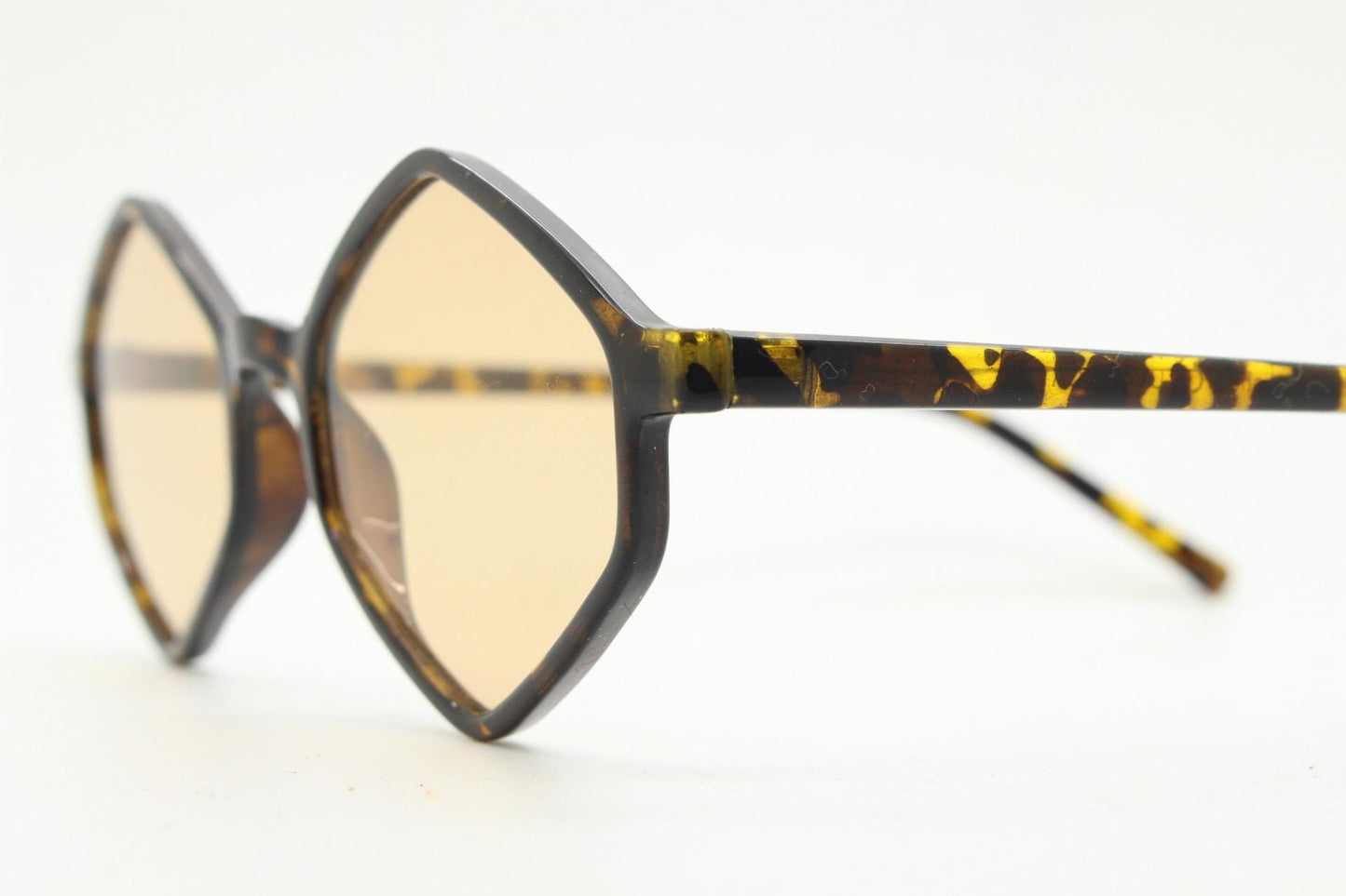 90s vintage diamond hexagon sunglasses. Atmospheric 6 sided tortoise gloss frame with very light tone brown lenses. Unused NOS