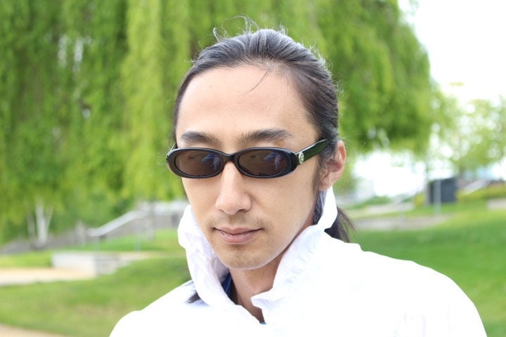 Guess vintage 90s low profile oval sunglasses. All black gloss quality acetate finish. New Old Stock