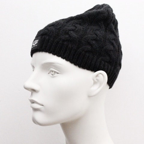Ugg Australia plain black knitted beanie hat. Aran pattern weave with ribbed edge. Pull down cap. BNWT
