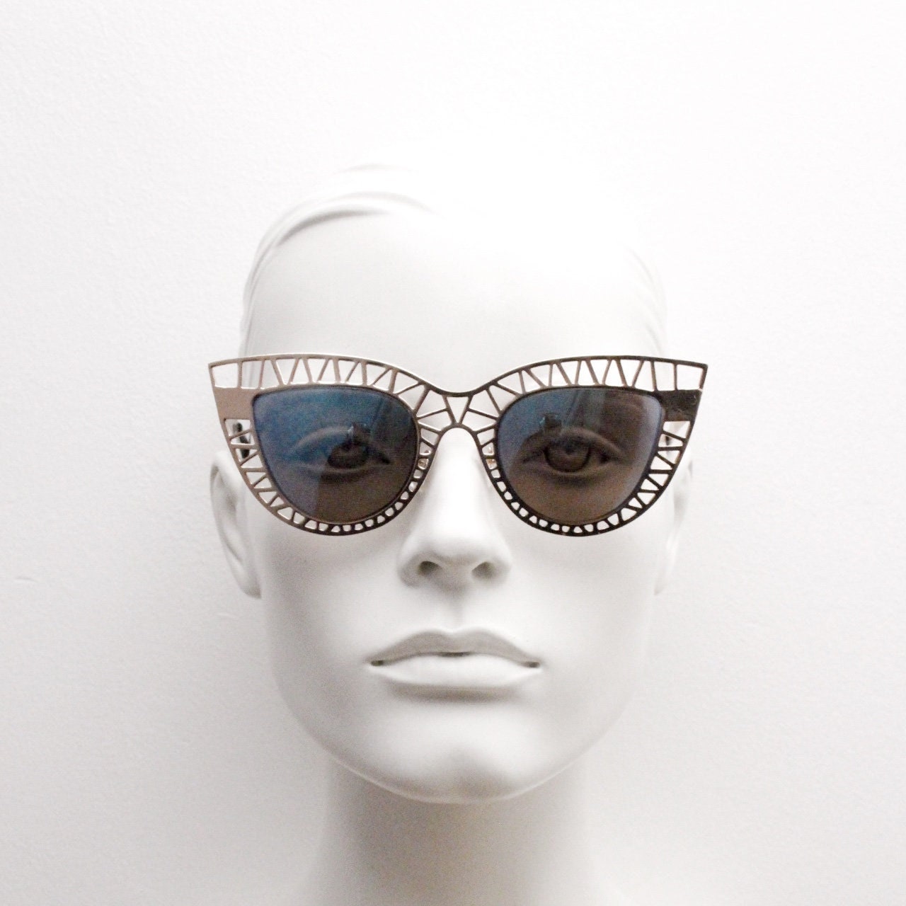 Y2K vintage metal cat eye sunglasses. Women's extraordinary gold cut out lattice scaffold cateye frame with blue mirror lenses. 2000s. BNWT