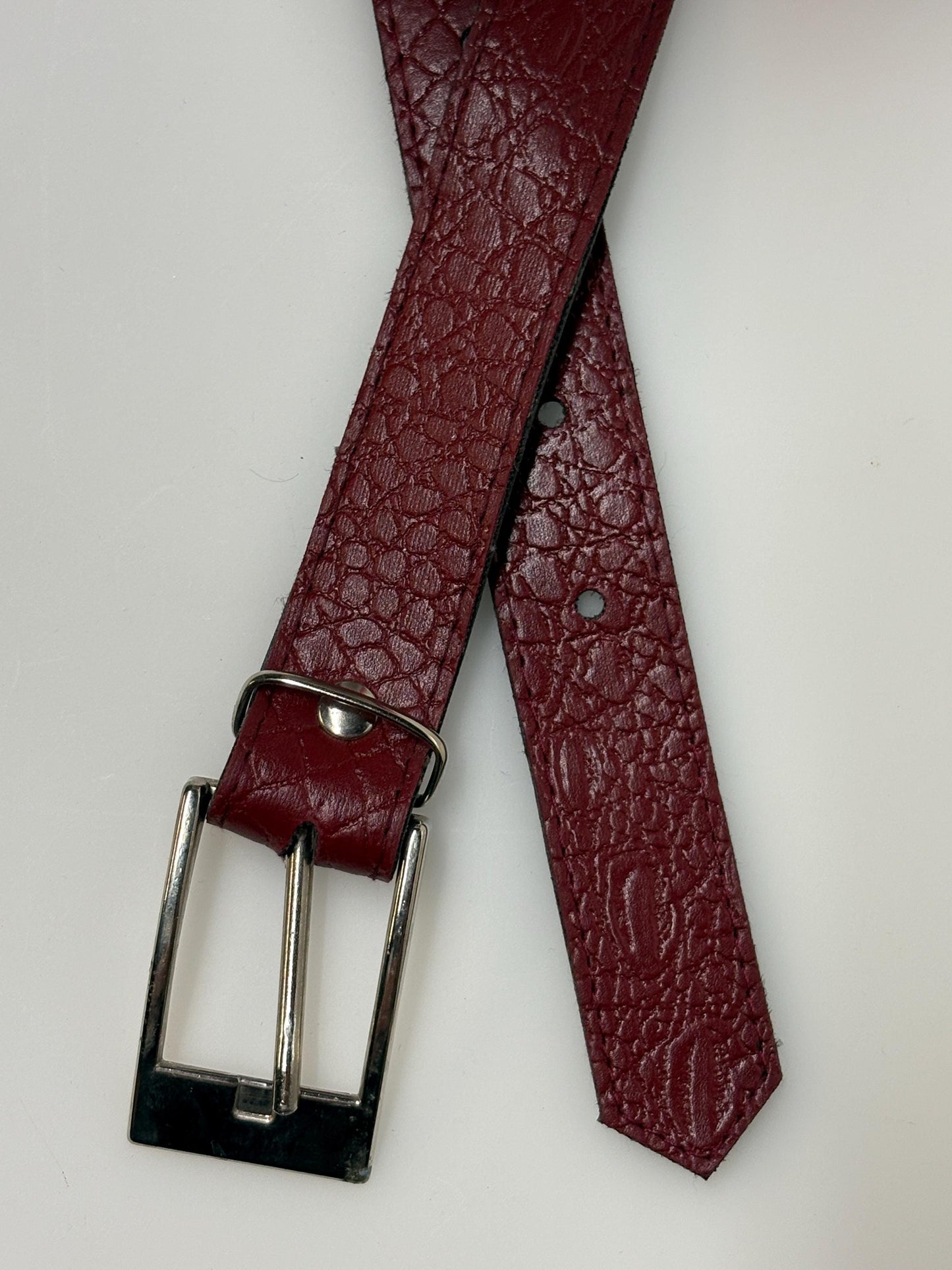 80s vintage womens embossed crocodile pattern 1" belt for jeans or trousers. Eco leather red vinyl with silver chrome buckle. Vegan