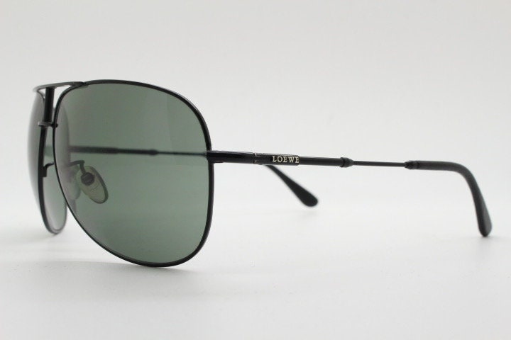 Loewe vintage aviator sunglasses in a tall black gloss frame with dark green lenses. Mens large teardrop pilot aviators. Y2K New Old Stock