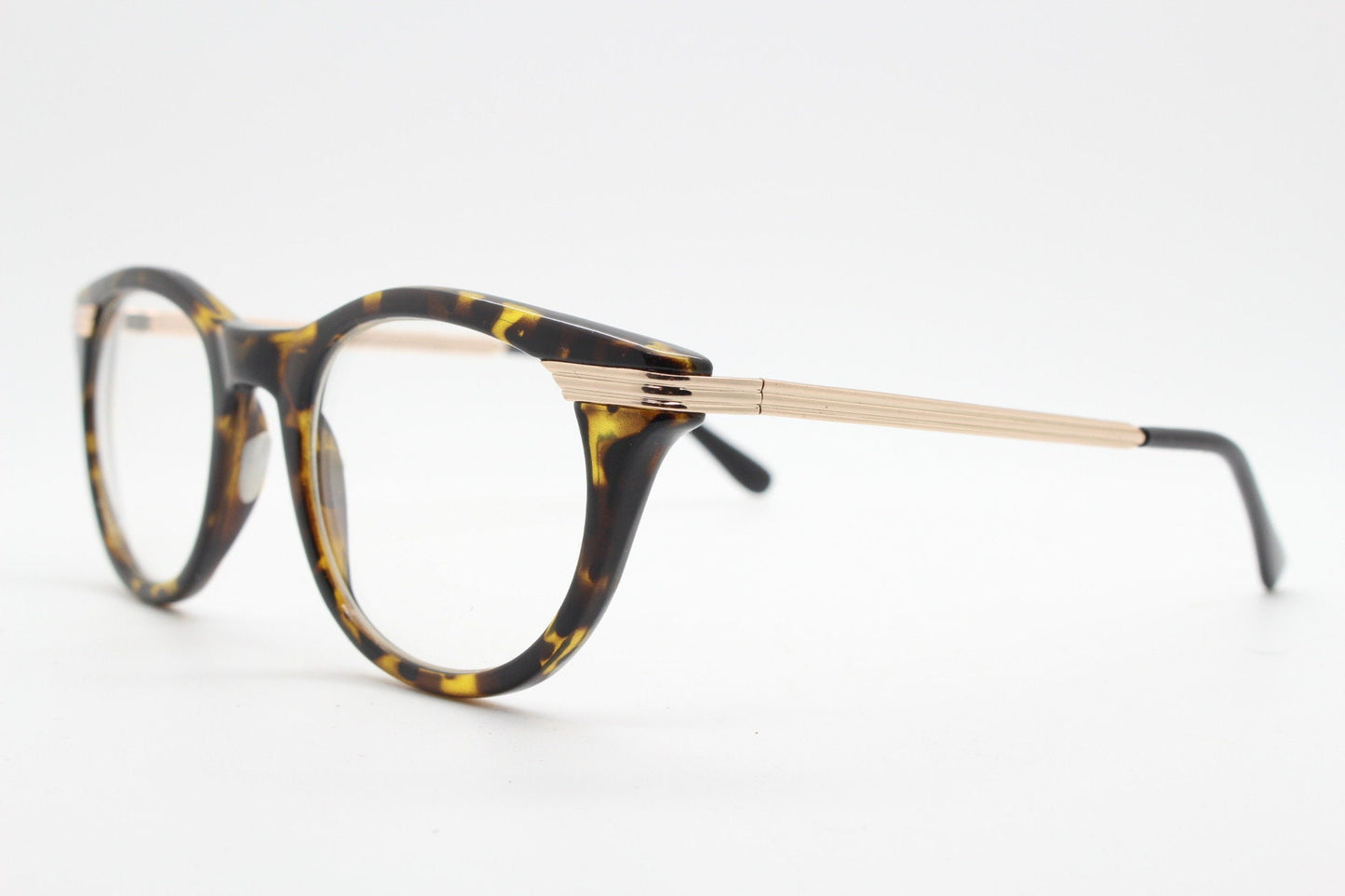 90s vintage cat eye glasses in tortoise with gold metal arms. 50s, 60s style cateye prescription optical frames. Clear lens eyeglasses. RX