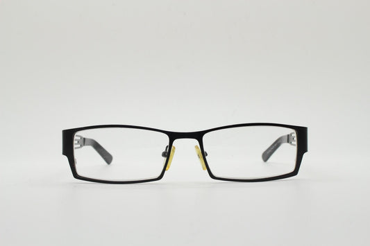 Police 90s vintage rectangular eye glasses model 023. Solid metal optical frame in black satin finish with cut out arm stripes. Prescription