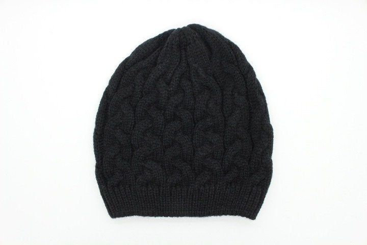 Ugg Australia plain black knitted beanie hat. Aran pattern weave with ribbed edge. Pull down cap. BNWT