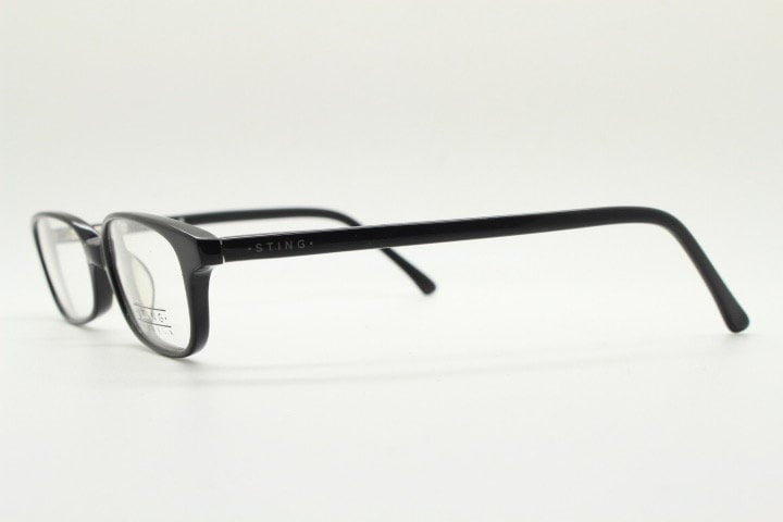 Sting 90s vintage rectangular eye glasses made in Italy. Plain black gloss low profile acetate optical frames. Prescription RX. NOS