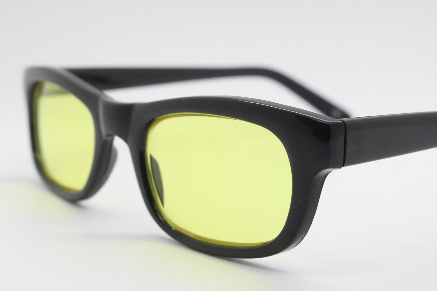 80s vintage rectangular sunglasses. Low profile slim black frame with psychedelic mod light tone canary yellow lenses. BNWT. NOS