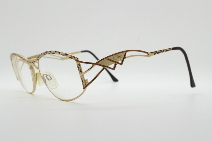 Cazal 90s vintage eye glasses. Mesmerising metallic animal print optical frames with innovative arm design. Prescription eyeglasses. RX