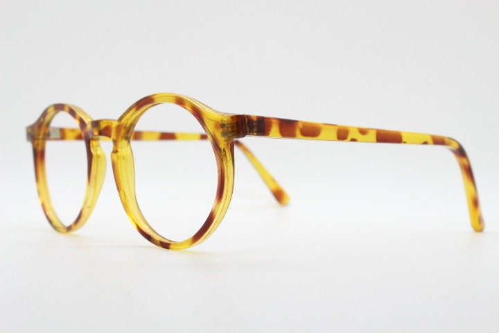 90s vintage round glasses. 30s, 40s design optical frames in a vibrant honey tortoise finish. Prescription eyeglasses. Spectacles.O Malley