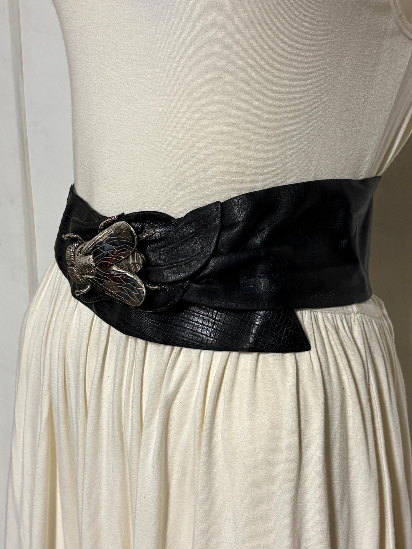 80s vintage womens black real leather dress belt with substantial dramatic big fly metal buckle. Womens sash. Statement feature belt
