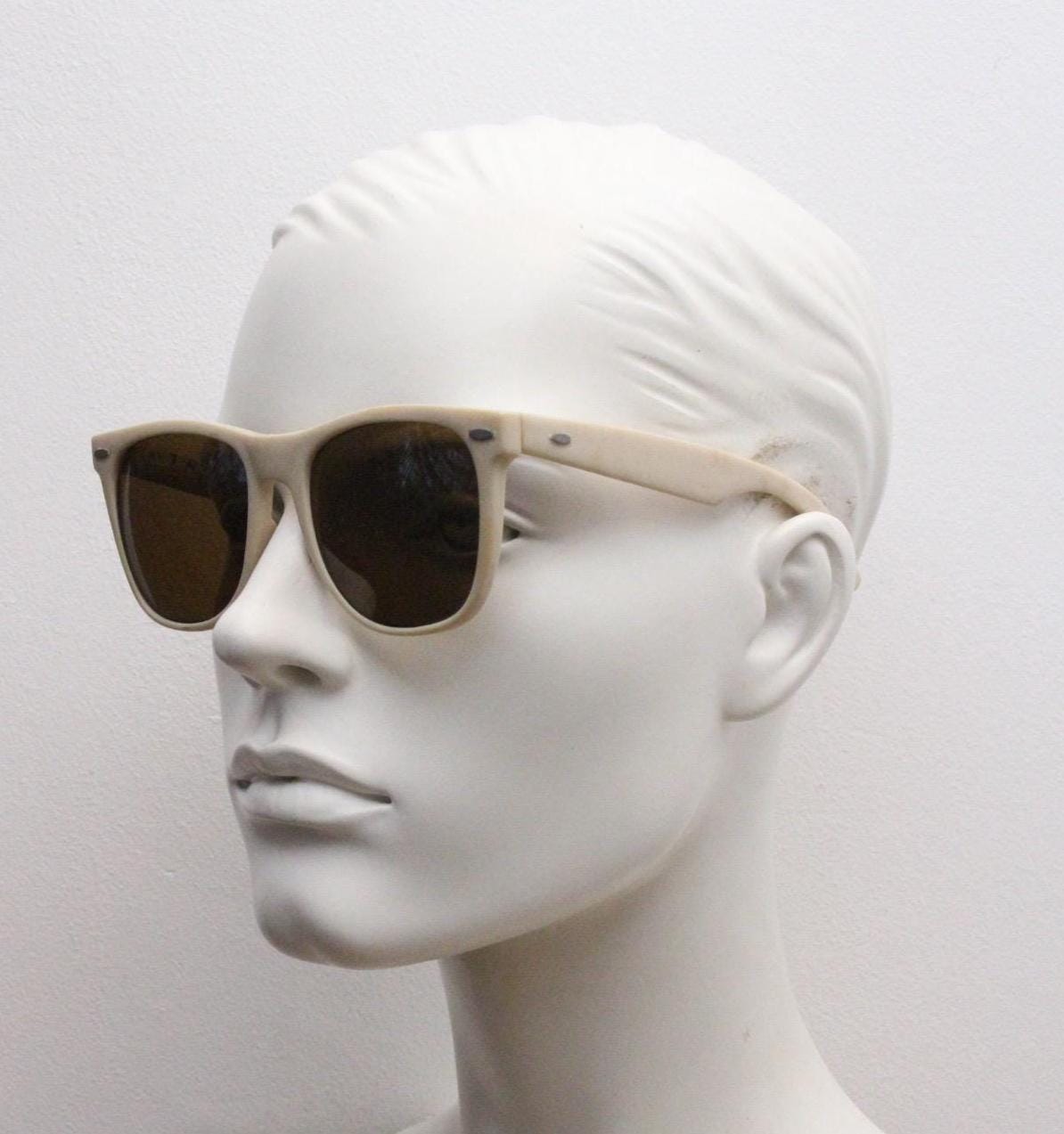 Vintage 80s wayfarer style sunglasses. All time classic slightly oversized design in matt white with brown lenses. Flava Flav