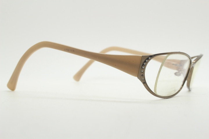Givenchy eye glasses in brown chrome with beige acetate arms and gold diamante detail. Rhinestone optical frames. Prescription eyeglasses RX