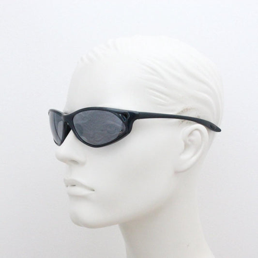 Y2K vintage sport shield sunglasses. Pearlised gunmetal grey wrap around visor with mirror lens. 90s NOS bug eye in neat dimensions. 2000s