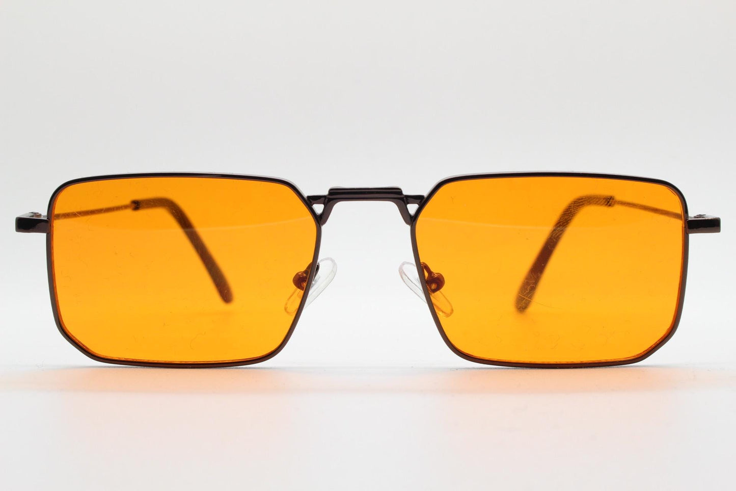 90s vintage angular 6 sided sunglasses. Brown chrome metal frame with blazing flat orange lenses. Rectangular psychedelic sunnies. BNWT