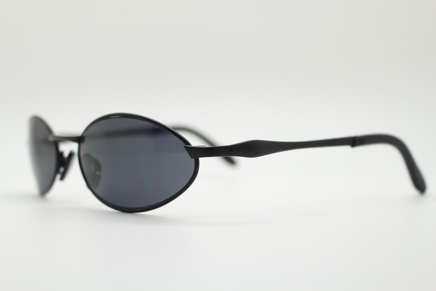 90s vintage small oval bug eye sunglasses. All black matt finish frame. Classic Matrix shape. Cosplay. Unworn NOS