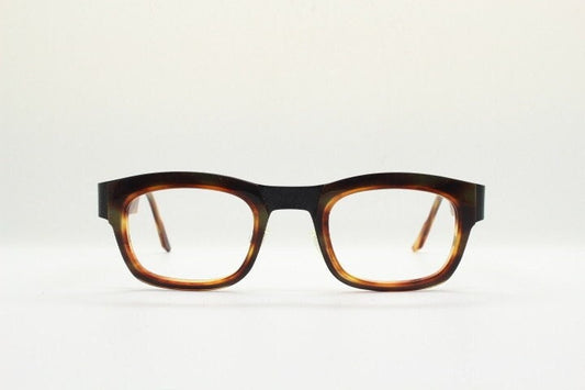 Anne et Valentin rectangular eye glasses hand made in France. Black matt titanium optical frame with mottled brown acetate. Prescription RX