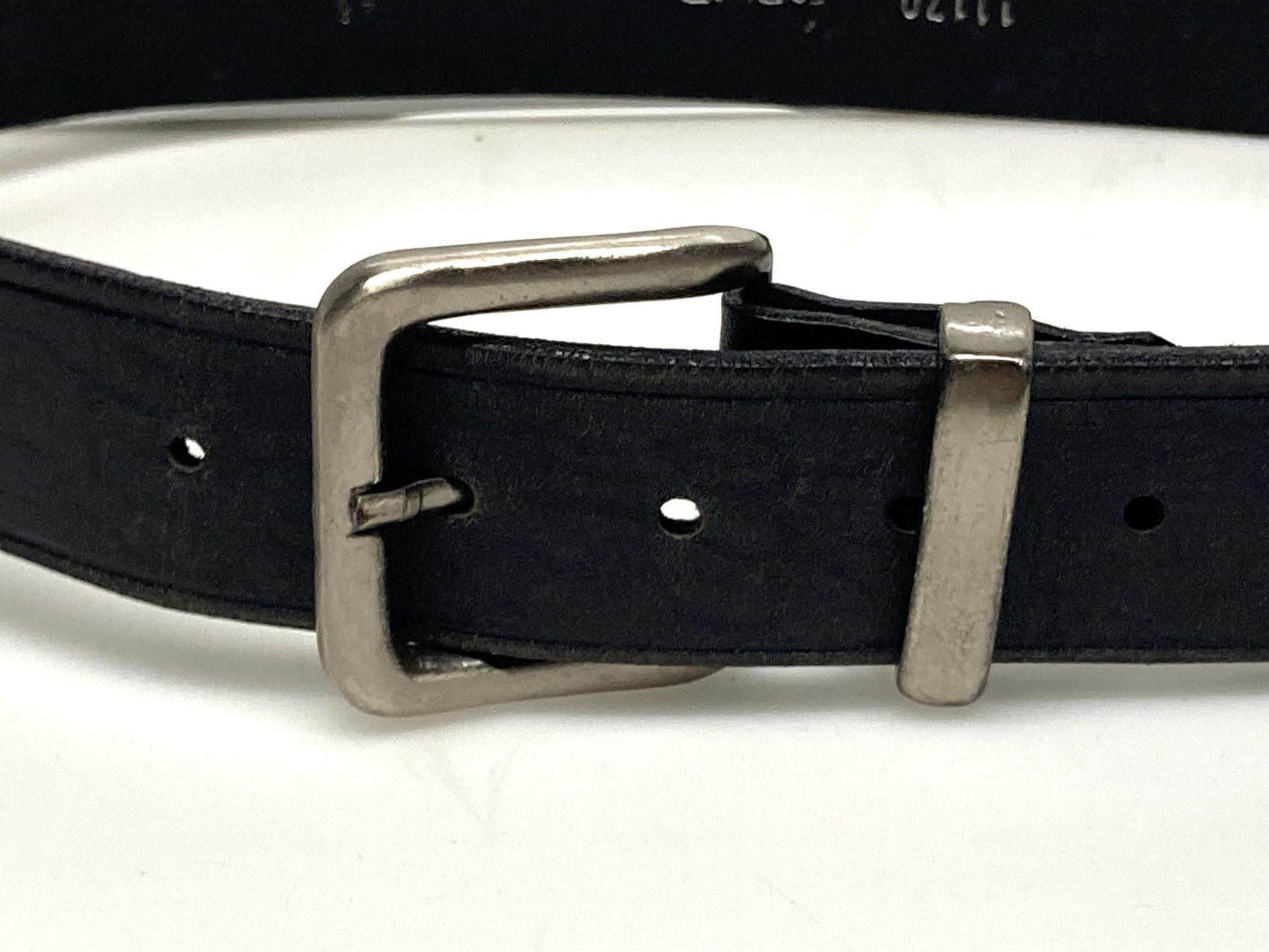 80s vintage plain black heavy duty genuine leather belt. Thick cowhide with substantial silver metal buckle. For trousers and jeans. Mens