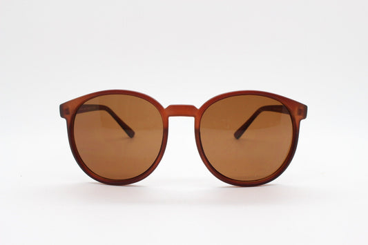 80s vintage round sunglasses. Slightly oversized slim transparent brown frame in a rubber finish with matching lenses. BNWT
