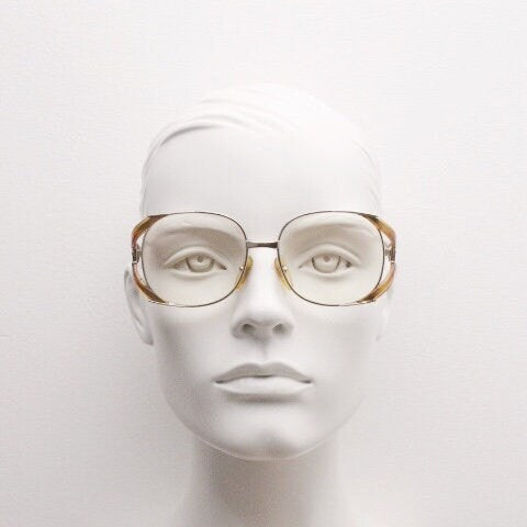 Christian Dior 70s vintage round eyeglasses model 2524 made in Germany from Optyl. Transparent brown optical frame. Prescription eyeglasses