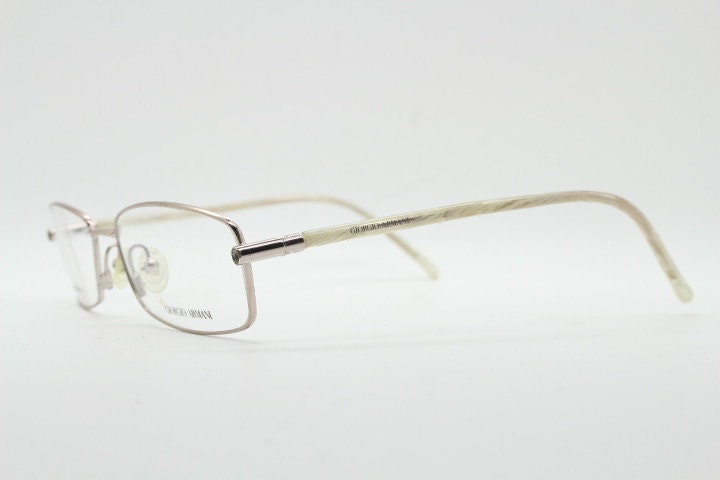Giorgio Armani 90s vintage oval eye glasses made in Italy. Gold front with marbled white acetate arms. Optical frames. Prescription RX