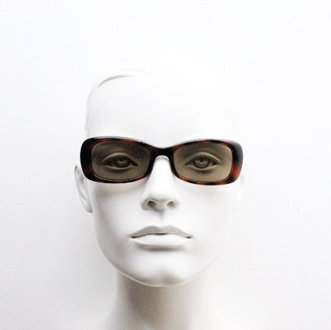 Calvin Klein 90s vintage thick framed rectangular sunglasses. Womens dark tortoise gloss low profile design.
