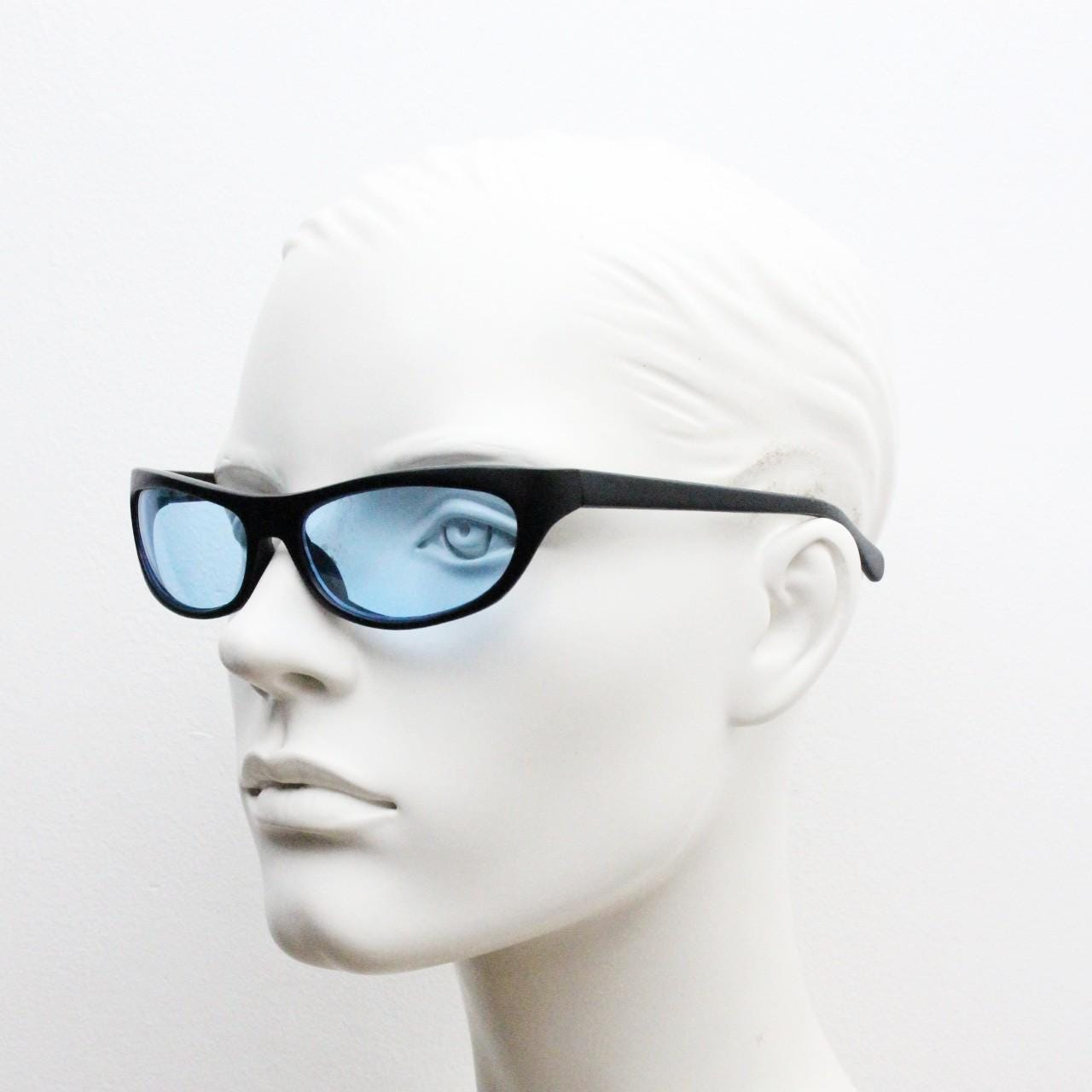 90s vintage curved wraparound sunglasses. Aerodynamic low profile black satin finish frame with light tone blue lenses. Sports shield. NOS