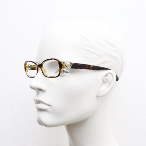Michael Kors vintage rectangular eye glasses. Tortoise layered acetate low profile cateye optical frame. Womens prescription spectacles
