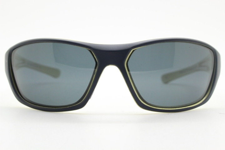 Y2K vintage sport shield sunglasses. All matt black wraparound aerodynamic visor with light green outline. 2000's. 90s. Unused NOS
