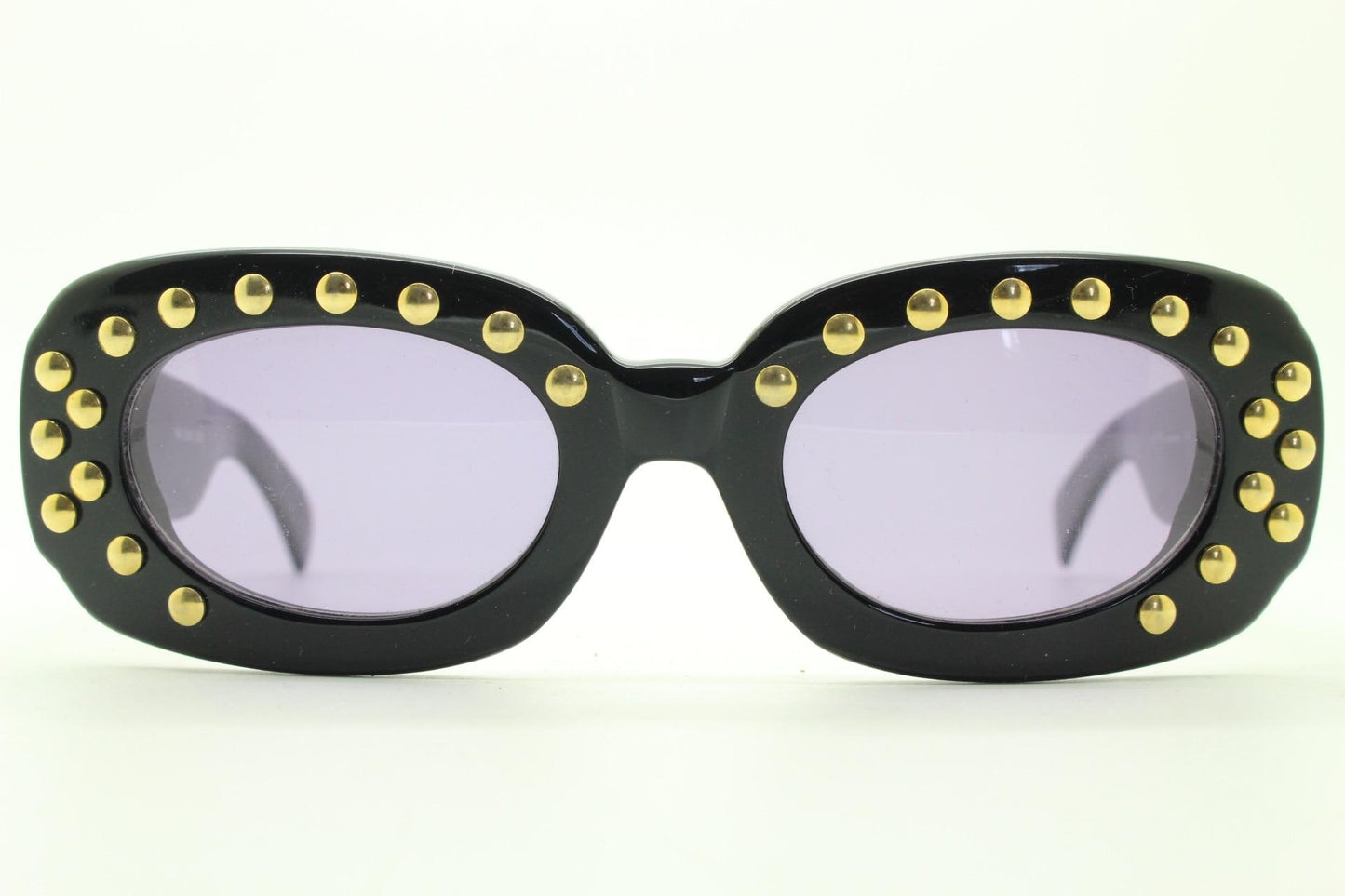 Lanvin vintage thick frame oval sunglasses with large golden dome studs. Womens 60s shape black acetate frame with atmospheric purple lenses