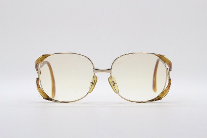 Christian Dior 70s vintage round eyeglasses model 2524 made in Germany from Optyl. Transparent brown optical frame. Prescription eyeglasses