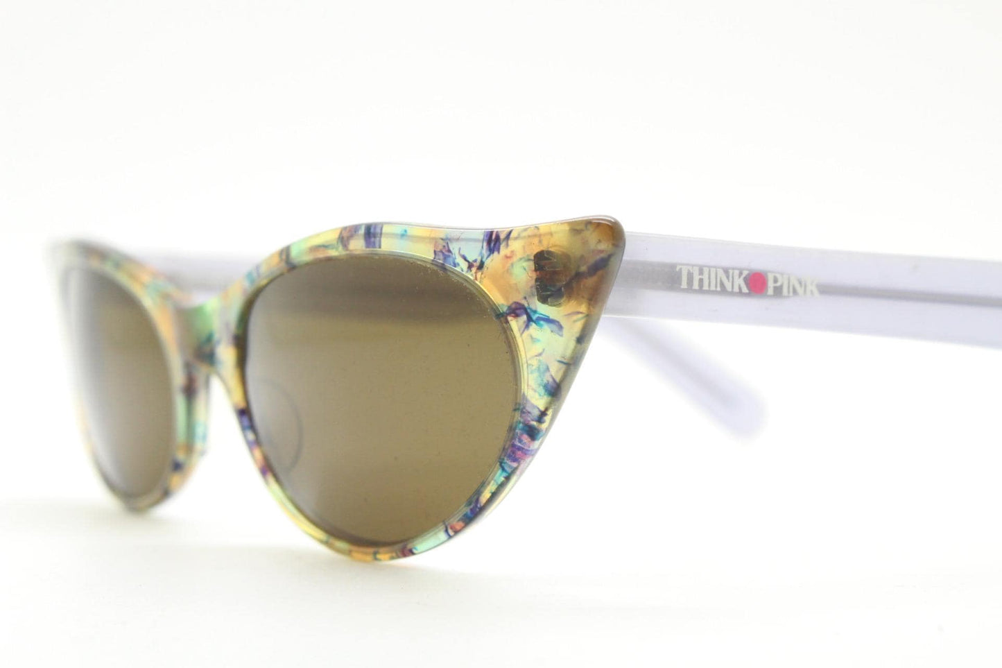 90s vintage extreme pointed cat eye sunglasses made in Italy. Multi colour marble front with lilac arms. Acetate cateye. NOS. Rockabilly