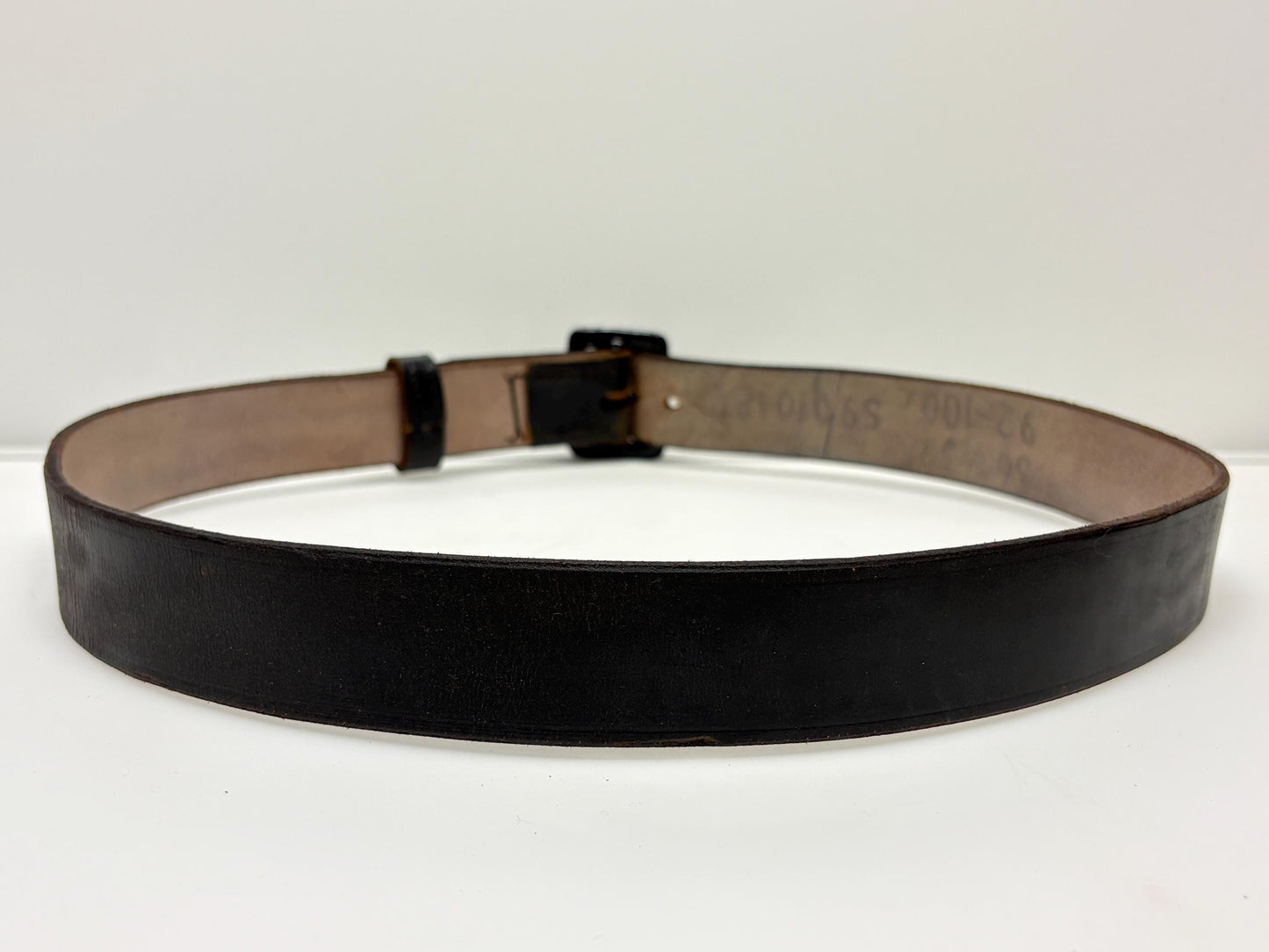 50s vintage black thick genuine leather army belt with solid metal buckle. Seamless single piece cowhide. For jeans trousers. Military NOS