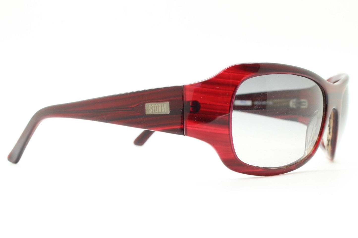 Y2k vintage wrap around large bug eye sunglasses. Curved red acetate shield frame with light tone lenses. 1960s bug eye design. 2000's NOS