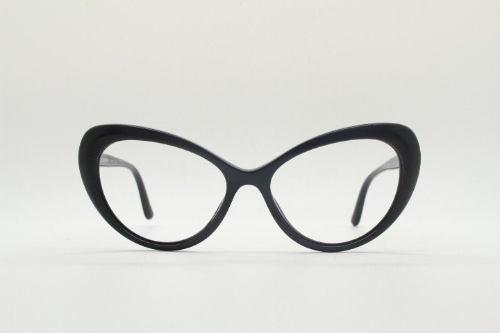 Dolce Gabbana oval cat eye glasses made in Italy. Stylised black gloss acetate optical frames. Womens prescription vintage cateye. RX pin up